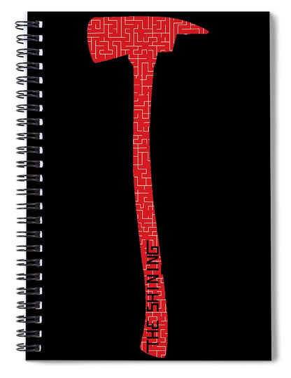 Spiral notebook with black cover and red geometric emblem design