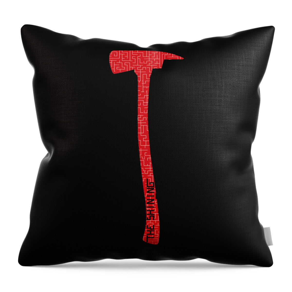 Black cushion with red axe graphic and Greek-key style head above vertical text