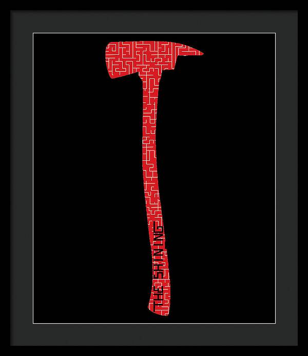 Framed print with red geometric axe silhouette on a black background, black frame