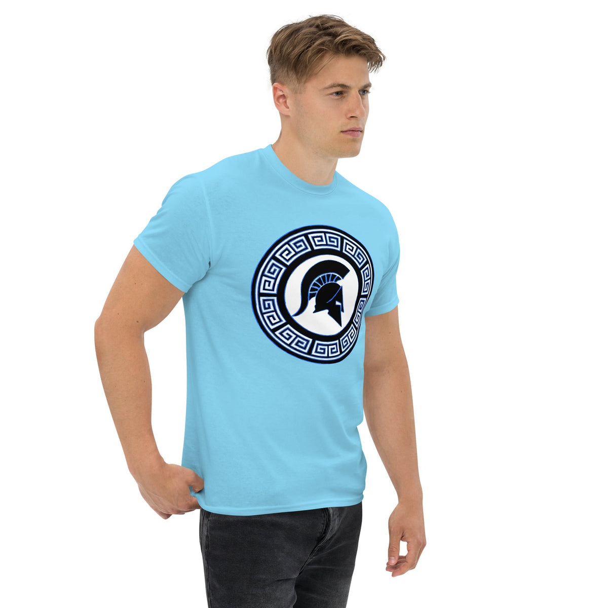 Sky blue crew-neck T-shirt with blue circular Spartan shield emblem on chest