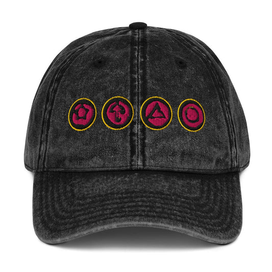 Vintage cotton twill cap, dark gray/black with embroidered pink emblem patches on front.