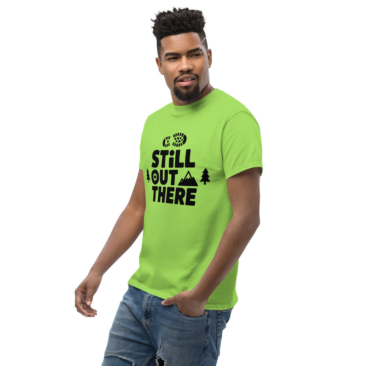 Lime green hiking T-shirt with black “Still Out There” logo graphic and paw-tree icon