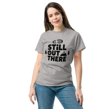Heather gray hiking T-shirt with black “Still Out There” logo graphic and paw-tree icon