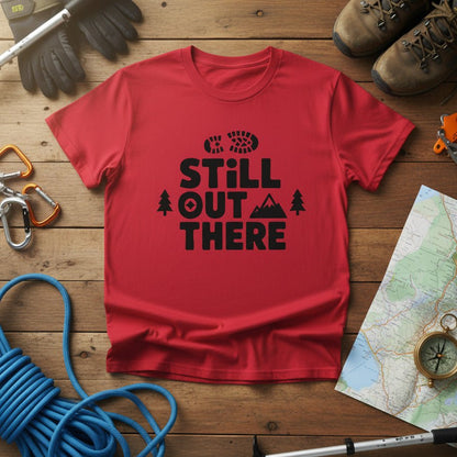 Red hiking T-shirt with black 'Still Out There' logo and tree graphic