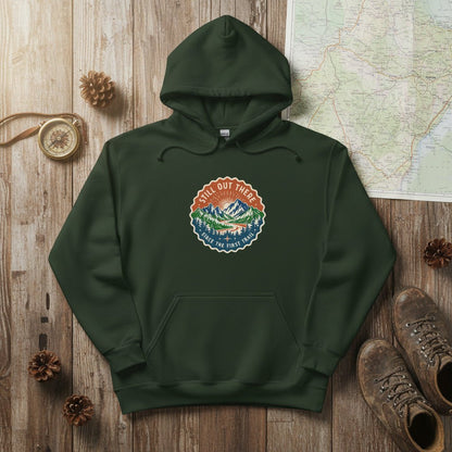 Forest green vintage mountain hoodie with front logo patch, kangaroo pocket, drawstring hood.
