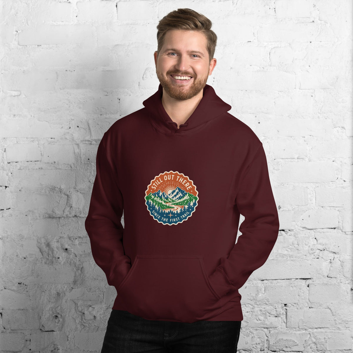 Maroon vintage-style mountain hoodie with hood, front pocket, and front logo patch