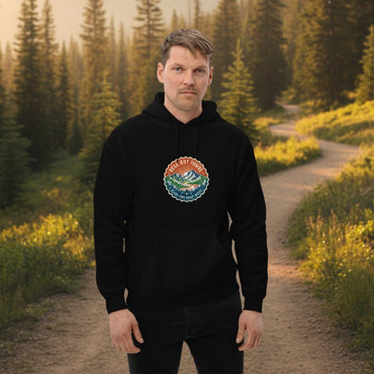 Black mountain hoodie on model with front logo patch, drawstring hood, kangaroo pocket.
