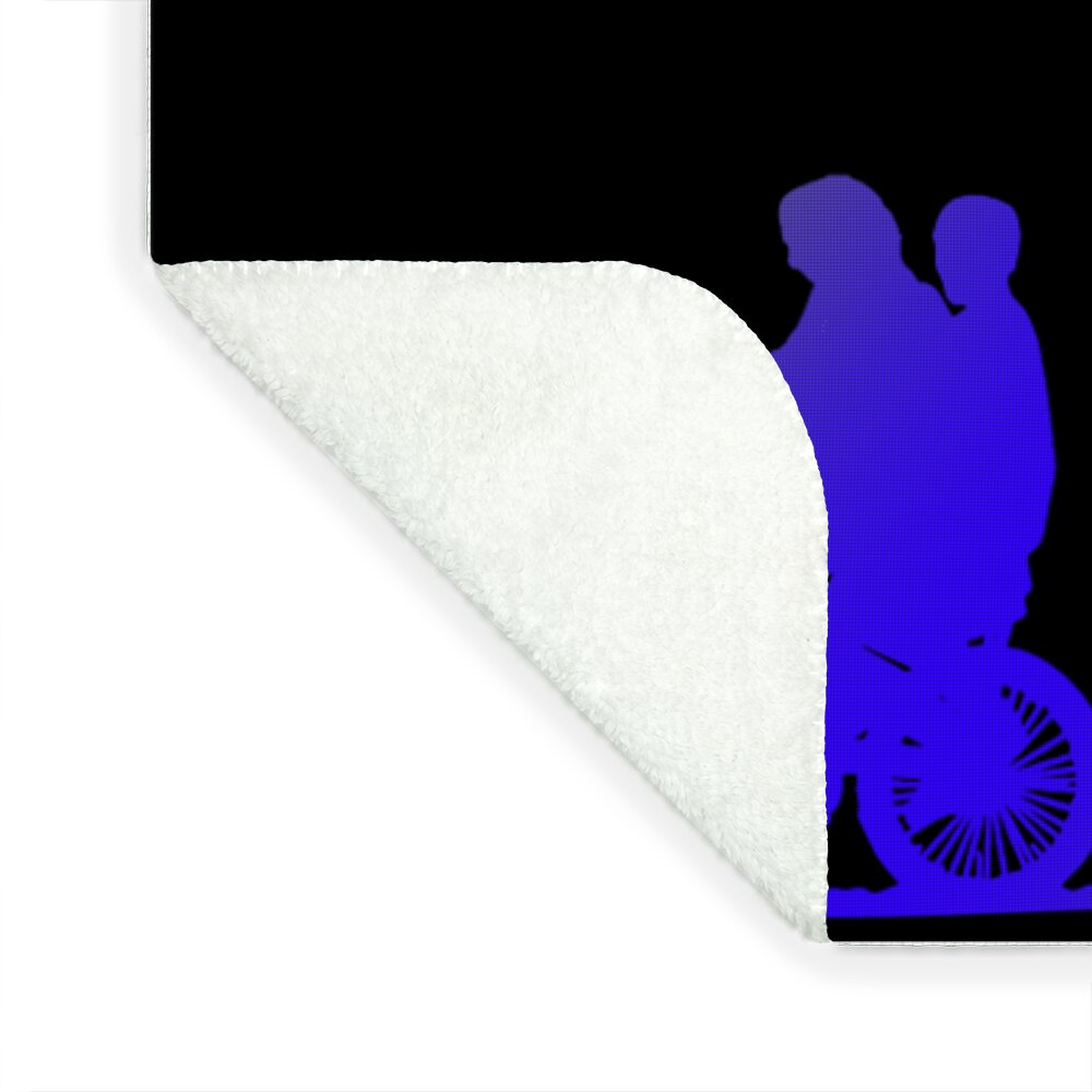 Kids blanket corner with white sherpa backing and partial neon Stranger Things rider print
