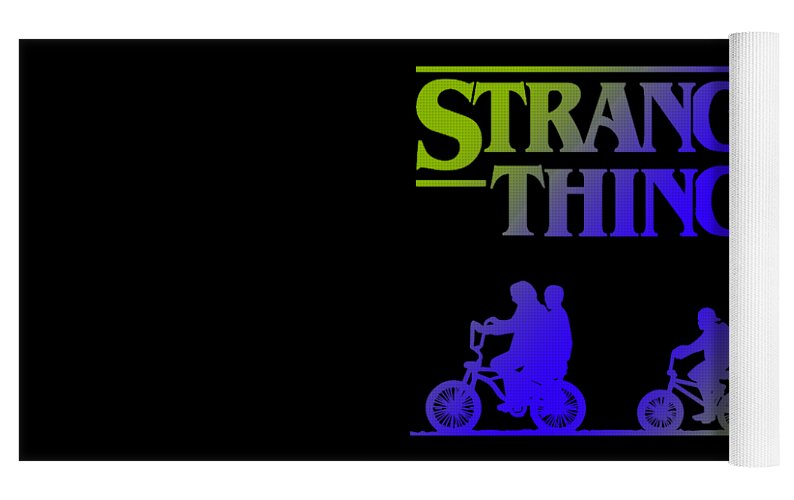 Kids yoga mat close-up showing partial Stranger Things logo and riders on black