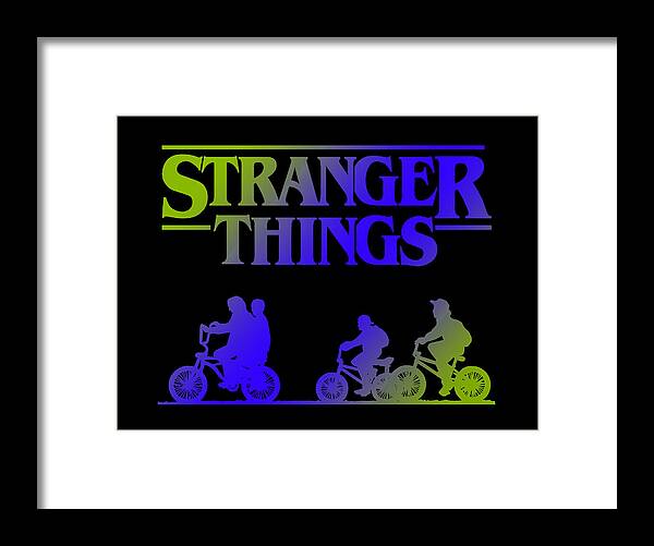 Framed Stranger Things print with neon kids on bikes, black frame and white border