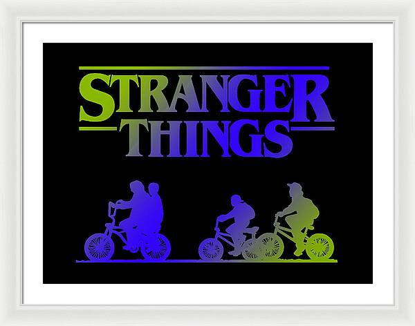 Framed print with white frame and mat, colorful “STRANGER THINGS” text, and bike silhouettes.