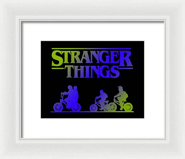 Framed Stranger Things print with neon kids on bikes, white frame and white mat