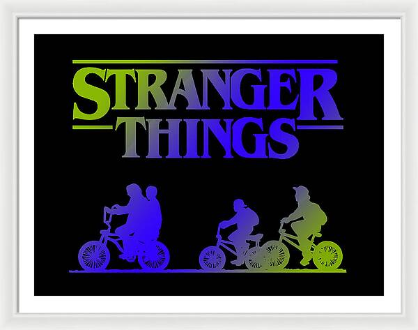 Framed print with white frame and mat, colorful “STRANGER THINGS” text, and bike silhouettes on black.