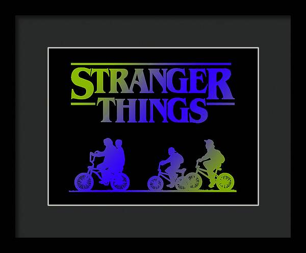 Framed Stranger Things print with neon kids on bikes, dark frame and black mat