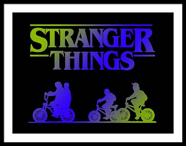 Framed print with white frame, colorful “STRANGER THINGS” text, and bike silhouettes on black.
