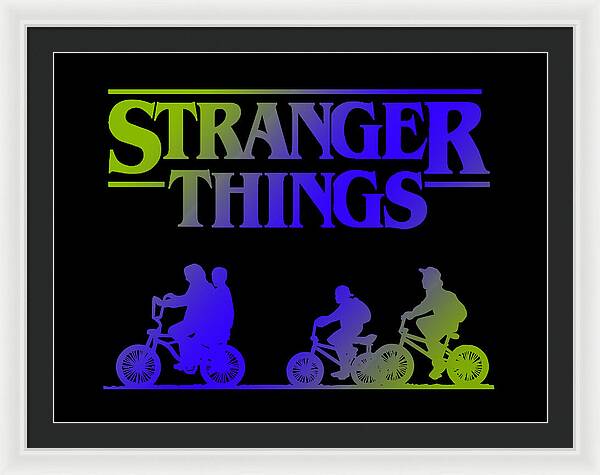 Framed print with white frame and dark mat, colorful “STRANGER THINGS” text, and bike silhouettes.