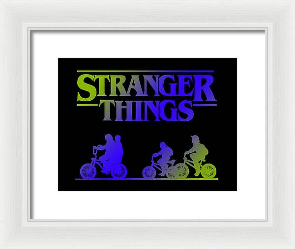 Framed Stranger Things print with neon kids on bikes, white frame and light mat