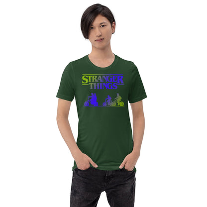 Forest green retro graphic t-shirt with colorful monster silhouettes and title text print