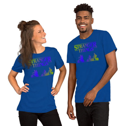 Blue retro graphic t-shirt with colorful monster silhouettes and title text print