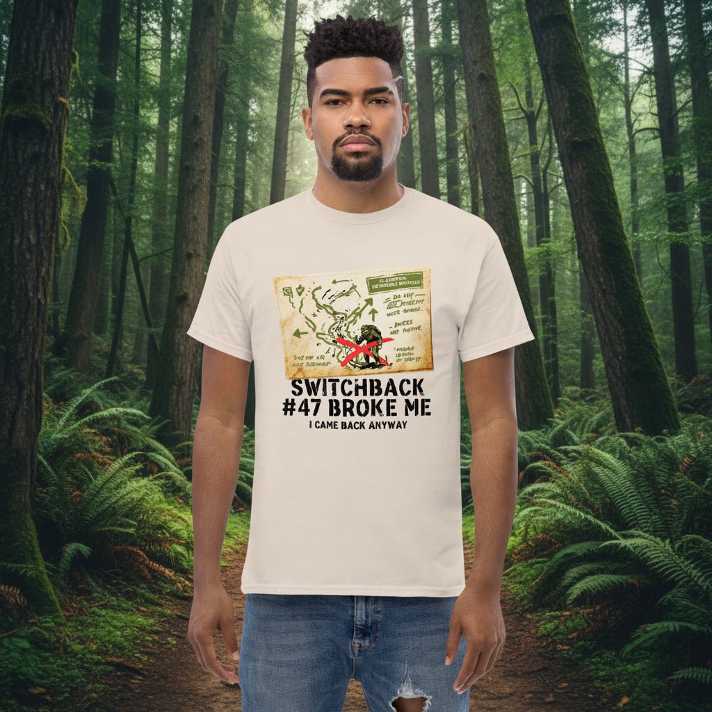 Natural (cream) hiking T-shirt with front map-style graphic and “Switchback #47 Broke Me”