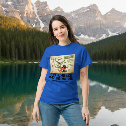 Royal blue hiking T-shirt with front map-style graphic and “Switchback #47 Broke Me”