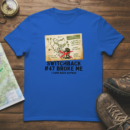 Royal blue hiking T-shirt with centered front graphic and “Switchback #47 Broke Me”