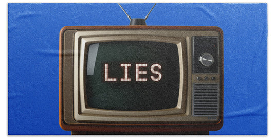 Bath towel with blue design of retro TV screen reading “LIES”