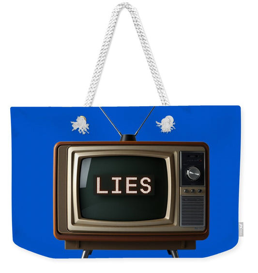 Blue weekender tote bag with white rope handles; TV graphic reading 'LIES'.
