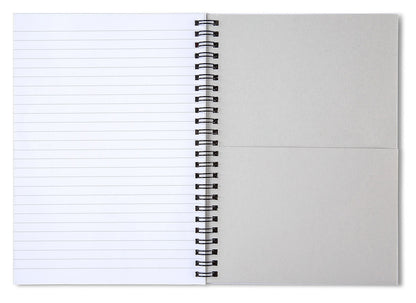 Spiral notebook open to ruled white pages with black metal ring binding