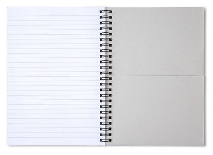 Spiral notebook open to lined pages with black spiral binding