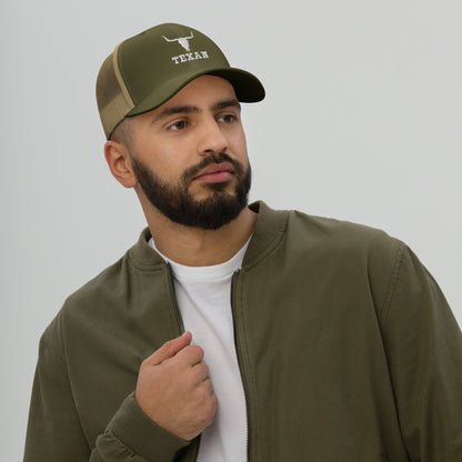 Olive green trucker hat with tan mesh panels and small bull and TEXAN logo