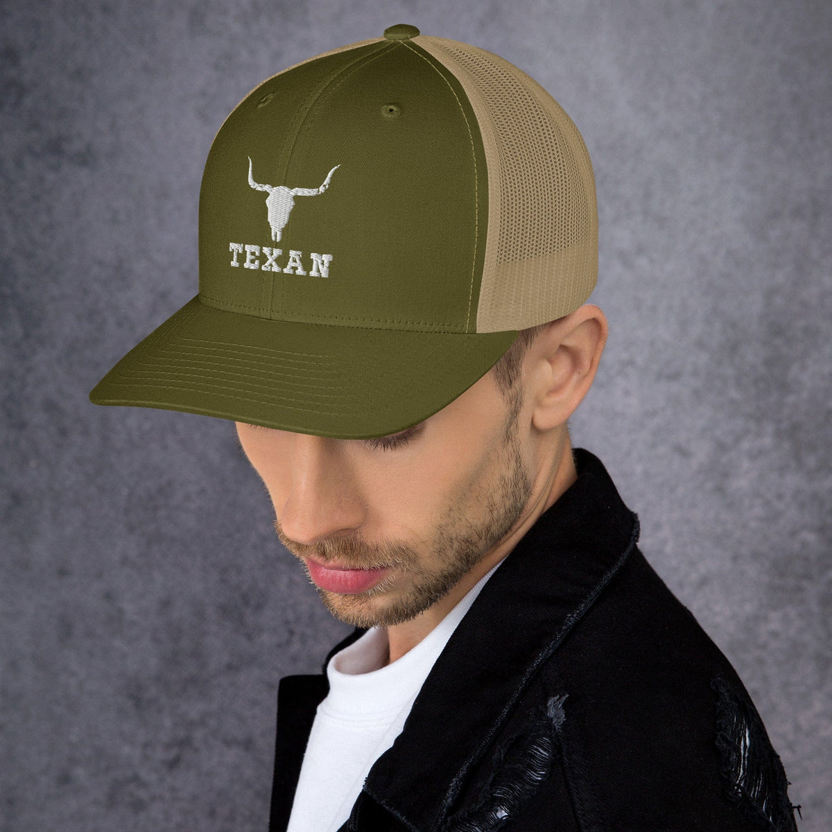 Two-tone mesh trucker hat, olive front and tan side panels, with longhorn and “TEXAN”