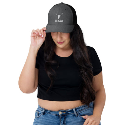 Charcoal trucker hat with bull outline and TEXAN logo on front