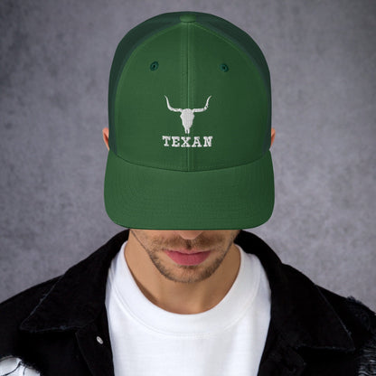 Green trucker hat with light bull and "TEXAN" embroidery