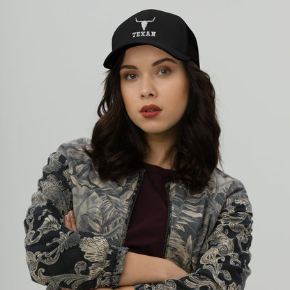 Black trucker hat with small bull and "TEXAN" logo on the front