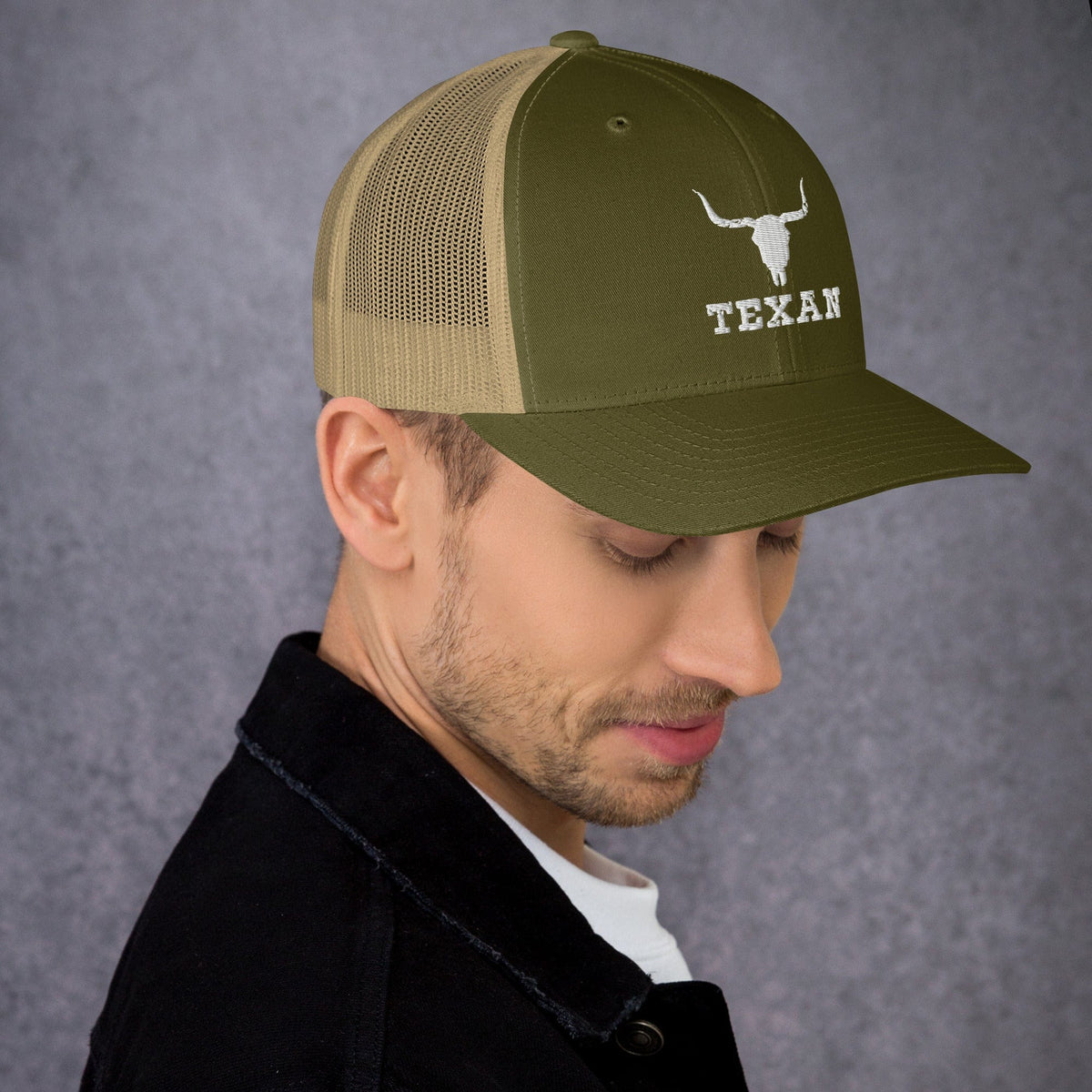 Two-tone trucker hat with olive front and tan mesh sides, longhorn and “TEXAN” logo