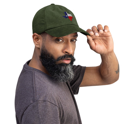 Dark olive corduroy baseball cap with embroidered Texas map patch on the front