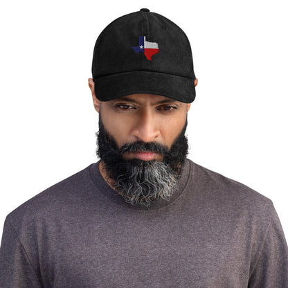 Black corduroy baseball cap with embroidered Texas map patch on the front