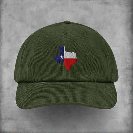 Green corduroy baseball cap with embroidered Texas map patch on front.