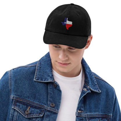 Tan corduroy baseball cap with embroidered Texas map patch, worn on model.