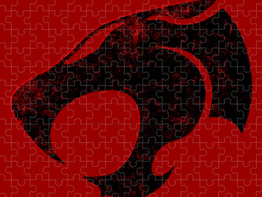 Thundercats puzzle sign with distressed black-and-red cat face, jigsaw-piece pattern