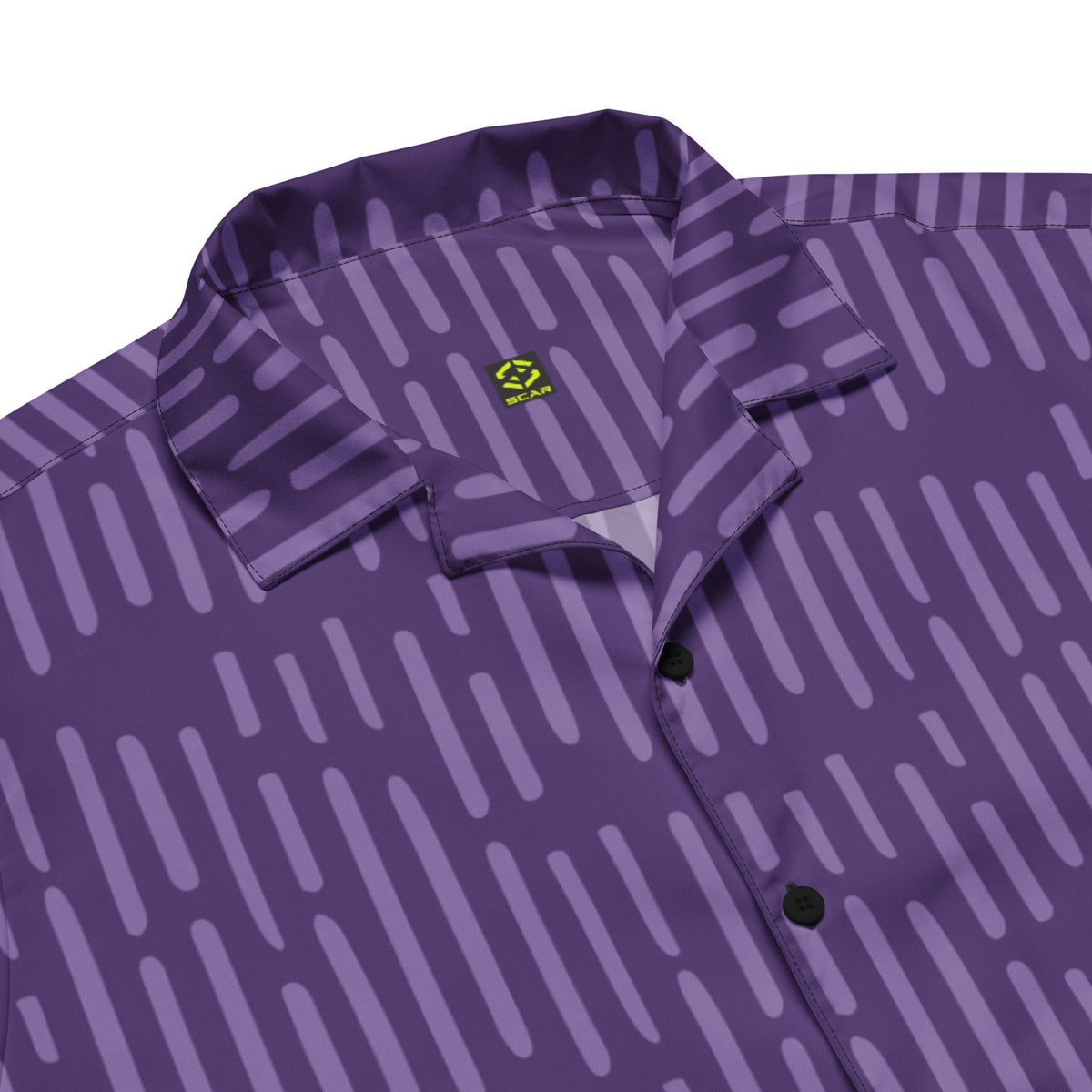 Close-up of purple patterned button-up shirt collar and front buttons