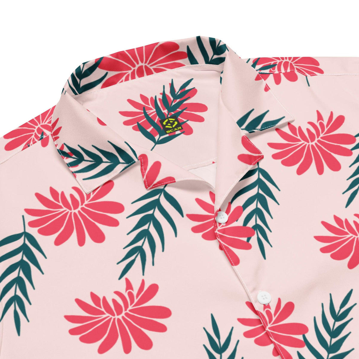 Pink short-sleeve tropical shirt close-up with red flowers, green leaves, button placket.