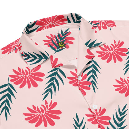 Pink short-sleeve tropical shirt close-up with red flowers, green leaves, button placket.