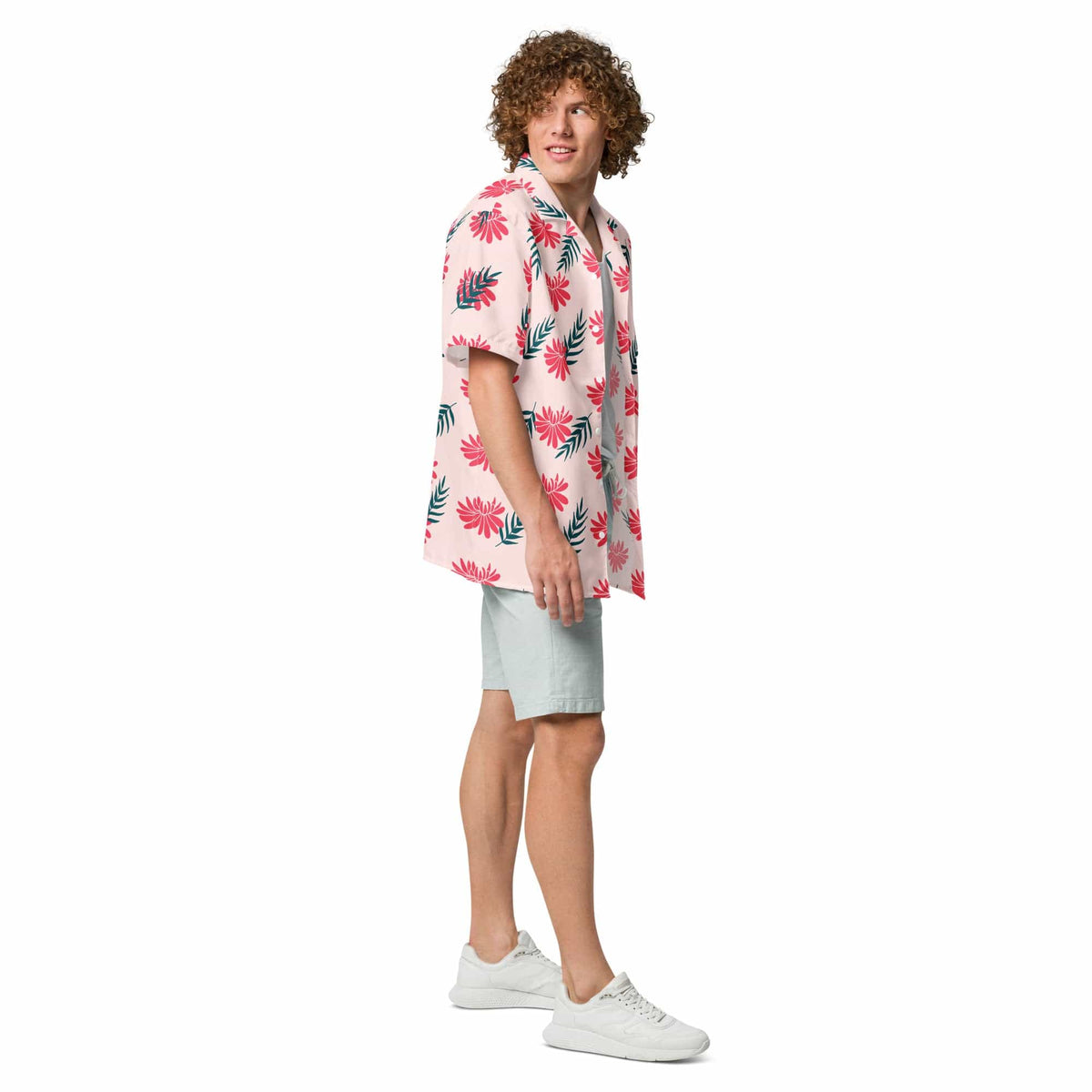 Light pink short-sleeve tropical button-up shirt with red flower and green leaf pattern.