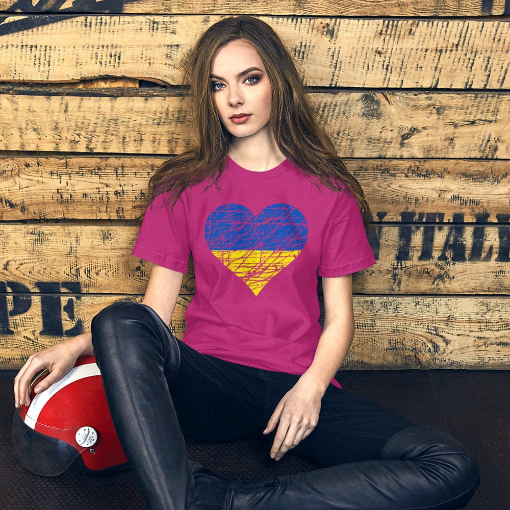 Magenta T-shirt with heart graphic in blue and yellow at center chest