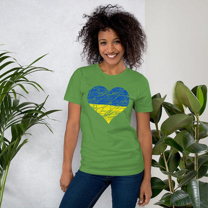 Green T-shirt with heart graphic in blue and yellow on the chest