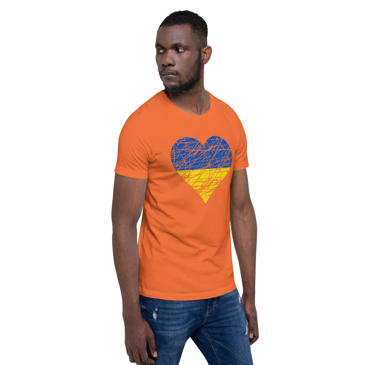 Orange T-shirt with heart graphic in blue and yellow on the chest