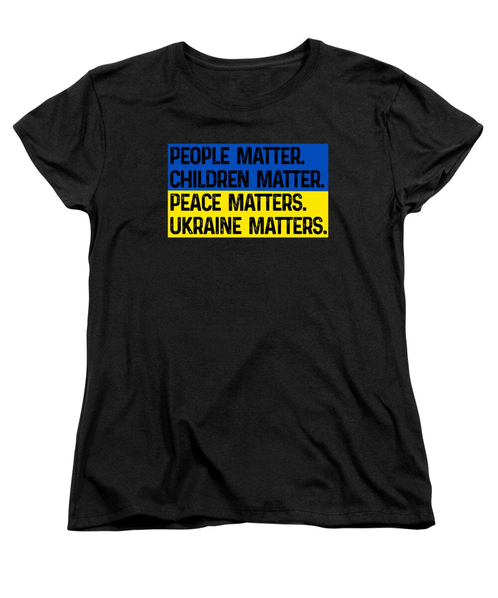 Women's black crewneck T-shirt with bold text graphic: PEOPLE, CHILDREN, PEACE, UKRAINE MATTERS