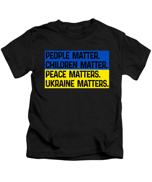 Kids black T-shirt with front slogan graphic in blue and yellow blocks